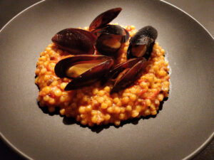 Fregola Sarda tostata con vongole - Pasta mit Muscheln